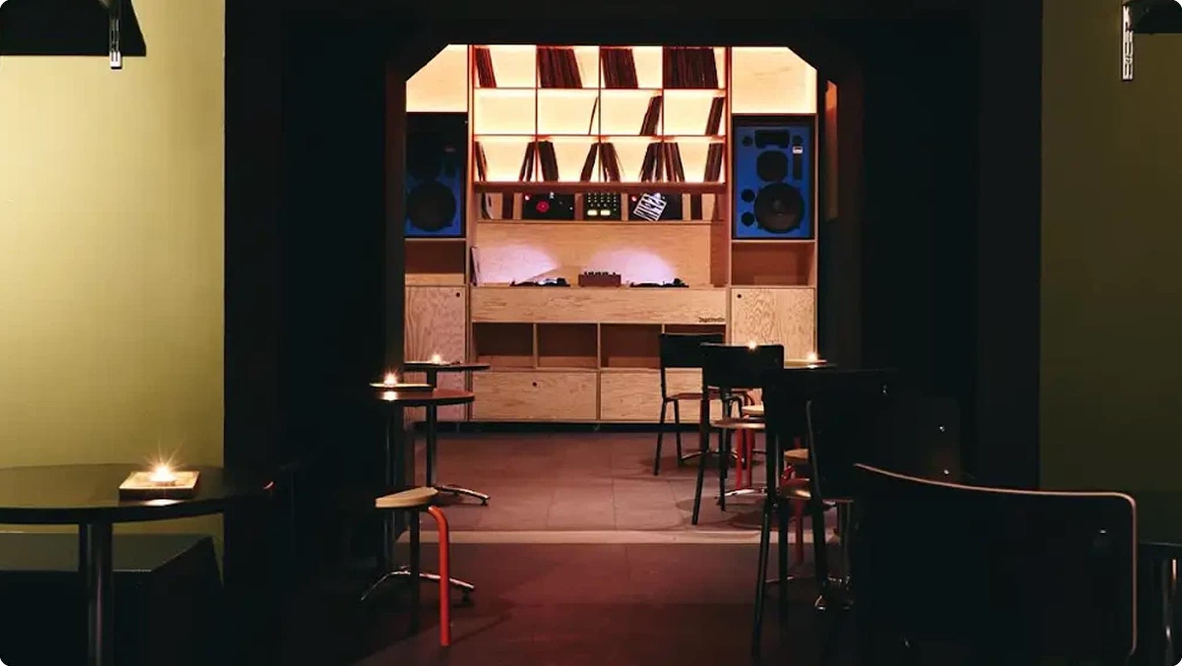 SPIN hi-fi listening bar interior with vinyl shelves and vintage speakers in Munich