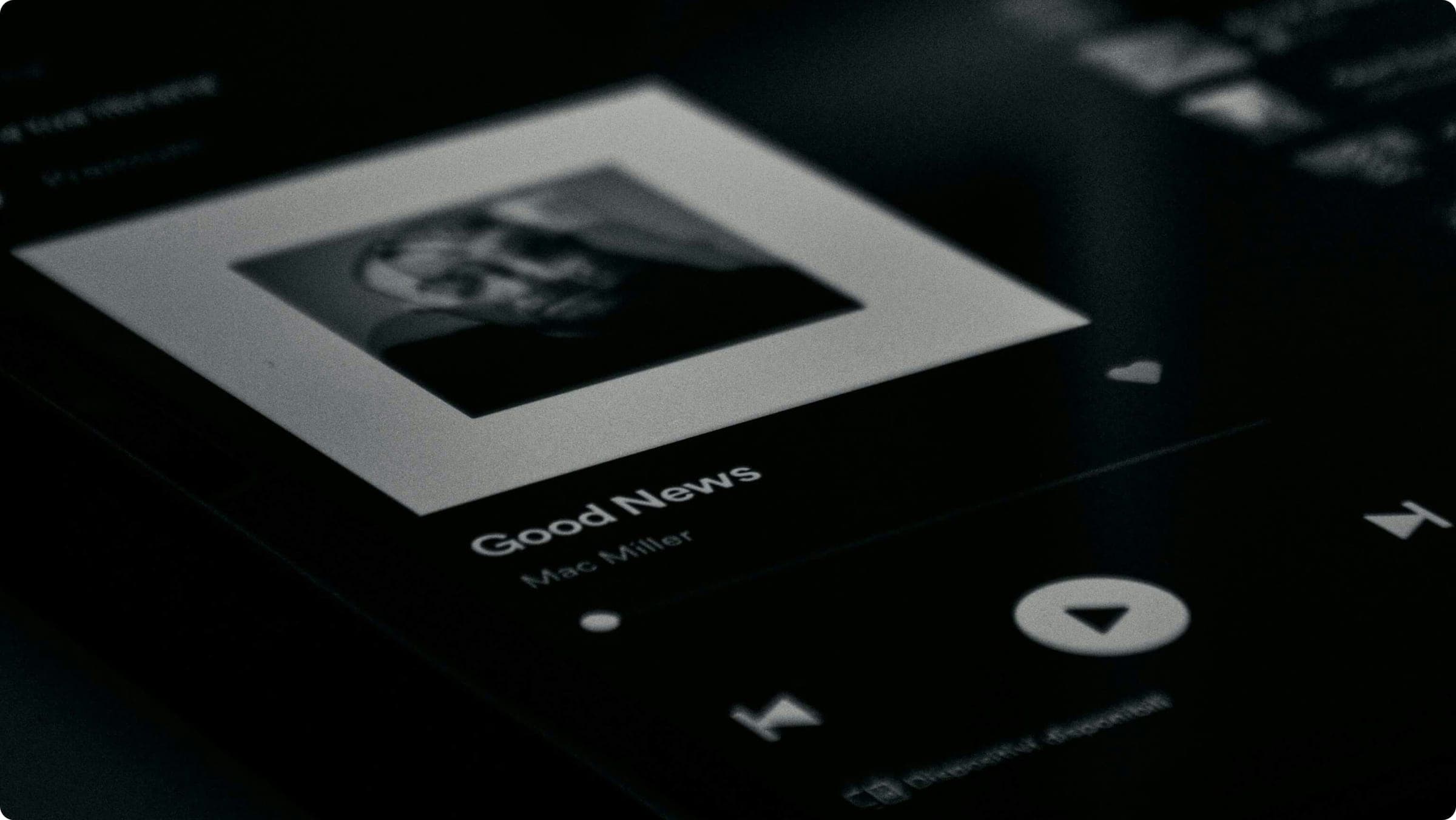 Smartphone screen showing Spotify interface with playlists being imported